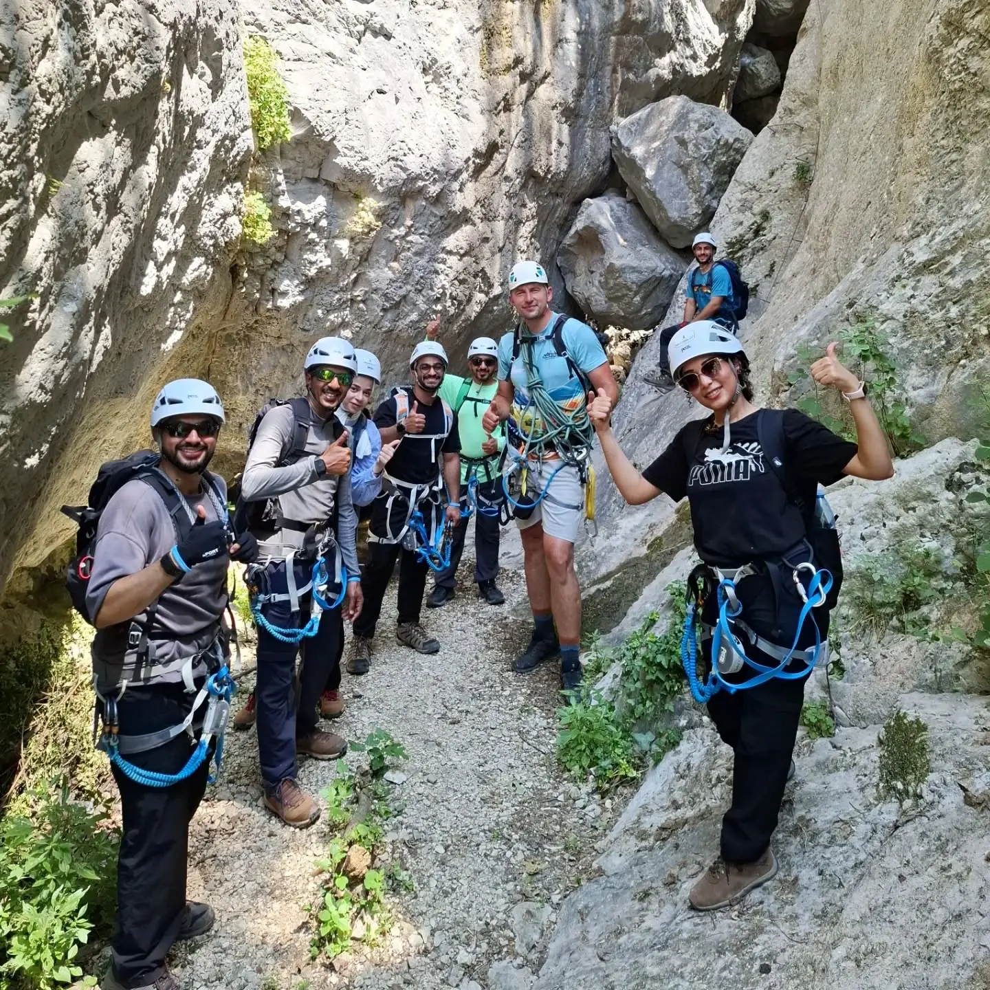 Colleagues on a via ferrata in a gorge in Bosnia and Herzegovina
