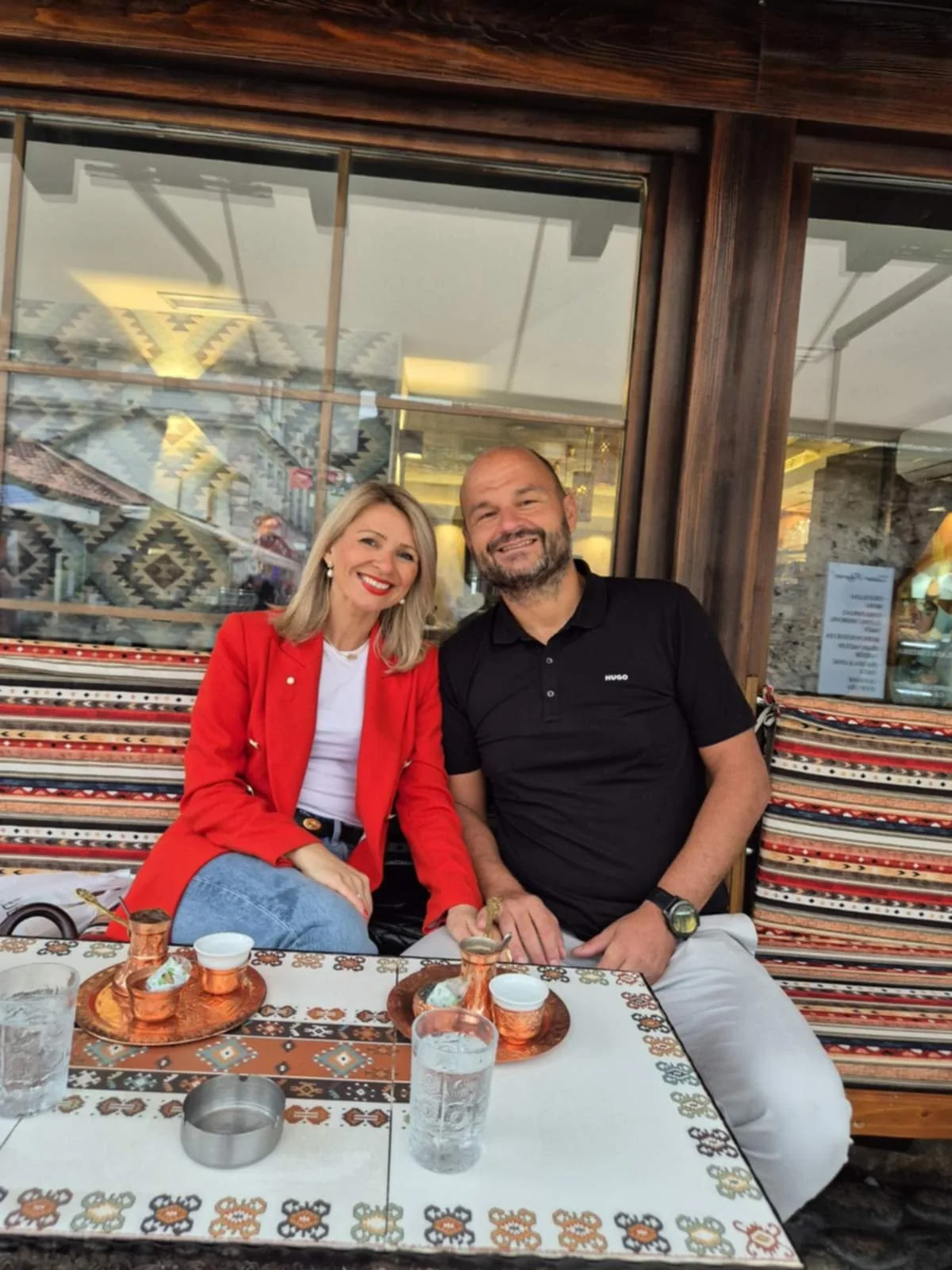 Arman and Ajla Asović over a cup of Bosnian coffee
