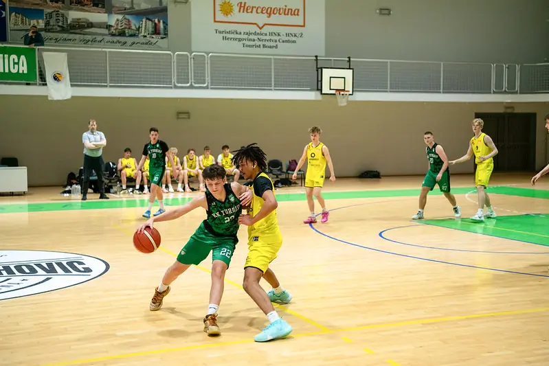 A youth basketball match in a Bosnian sports hall